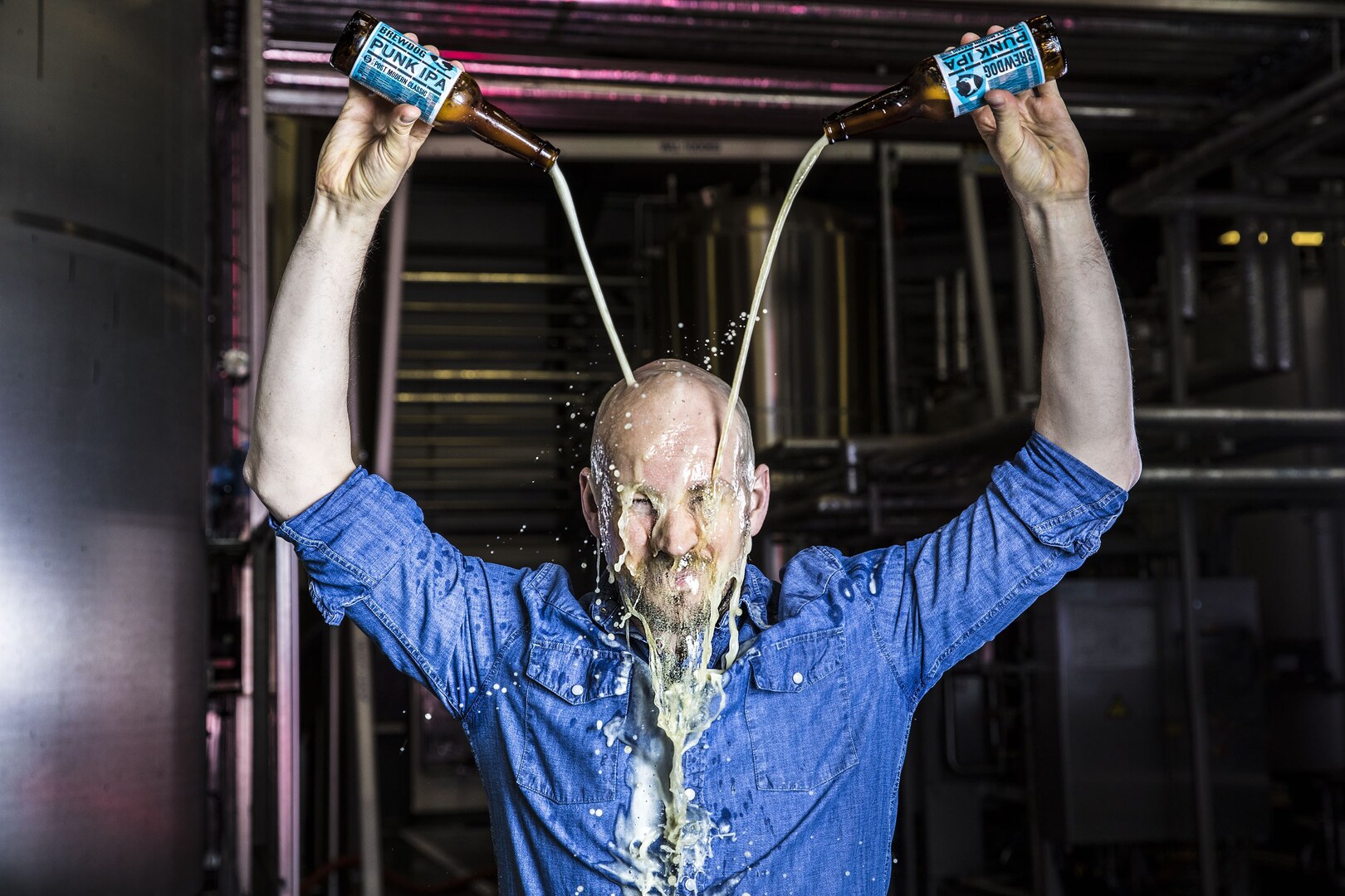 James Watt, Brewdog founder, with beer pouring over his head.